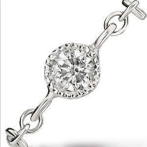 Maria tash white diamond double piercing